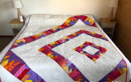 Peak’s Sunset - A 2018 QuiltCon Charity Challenge Quilt